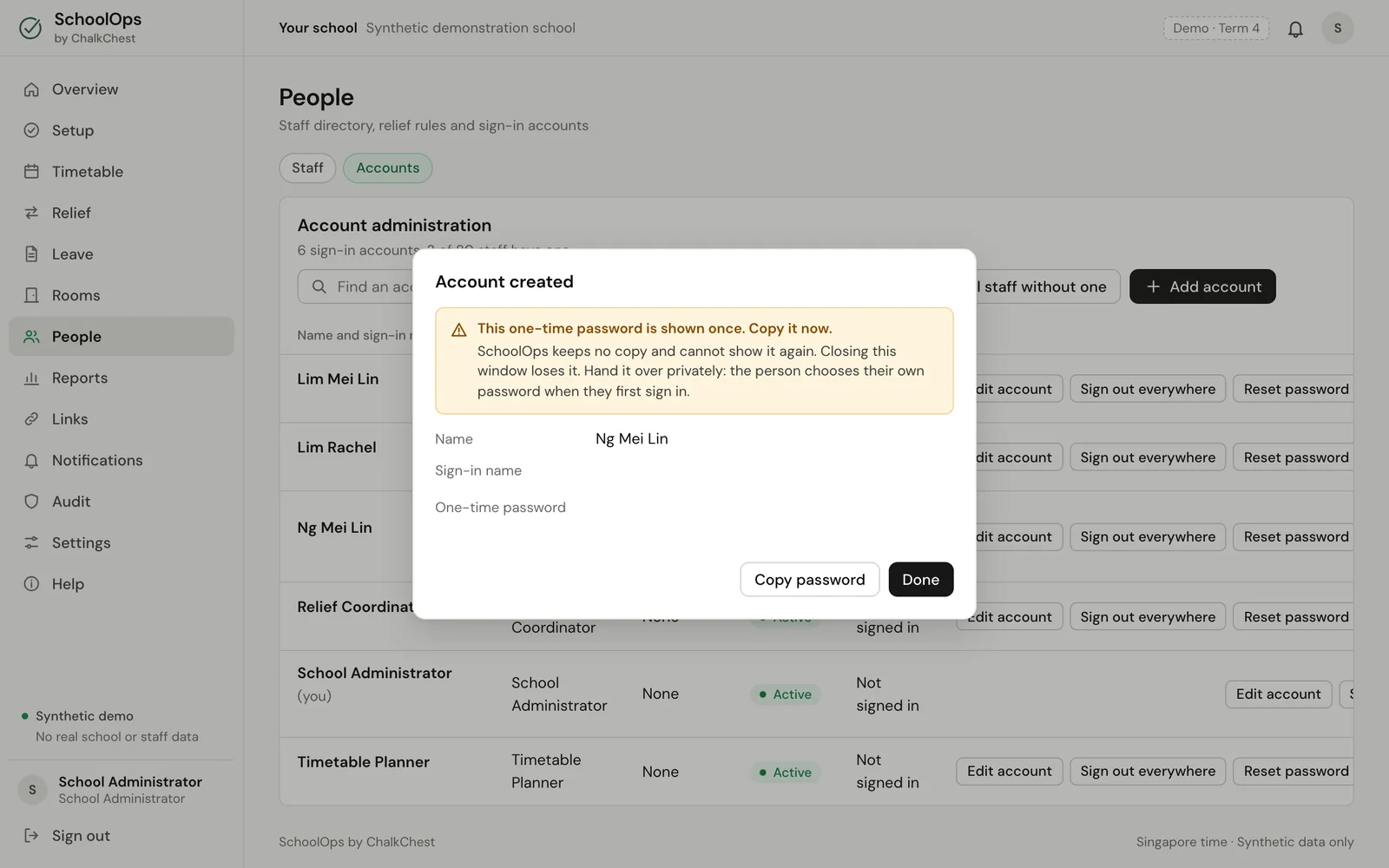 The window that shows a new account’s one-time password once. Fictional demo data.