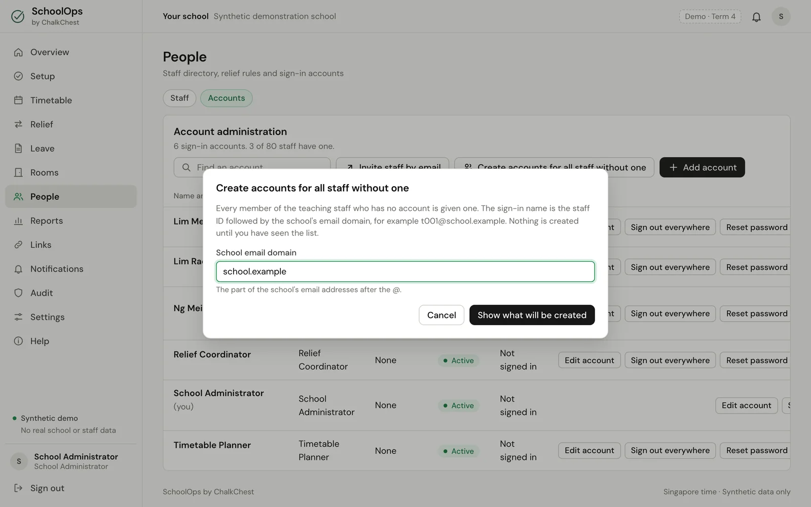 Typing the school’s email domain. Fictional demo data.